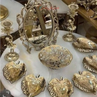 خرید آنلاین، هفت سین طرح برگ با شمعدان های پرنس، جنس برنزی با کیفیت اعلاء، زیر قیمت بازار | چترزندگی